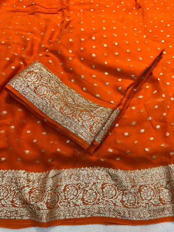 Orange Viscose Georgette Saree with Golden Woven Border & Running Blouse