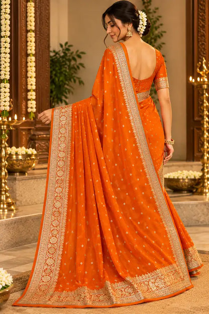 Orange Viscose Georgette Saree with Golden Woven Border & Running Blouse