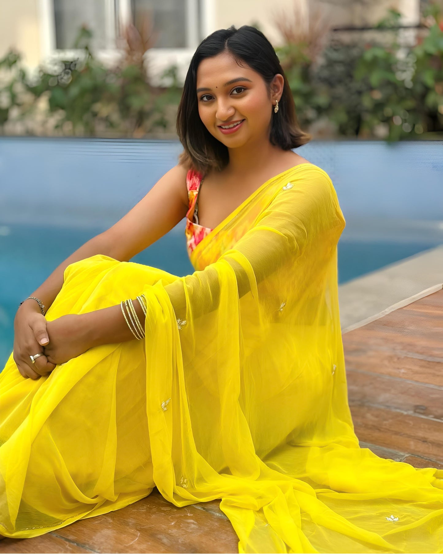 Premium Georgette Fabric, Offering a Soft And Graceful Drape Saree