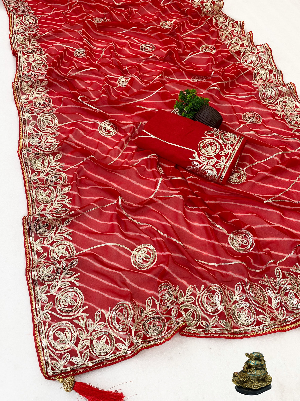 Premium Soft C.C. Georgette Lehriya Silk Saree with Traditional Ribbon Design